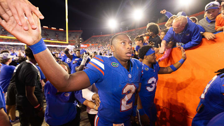 Florida Gators quarterback DJ Lagway (2) shakes hands with fans during the second half at Ben Hill Griffin Stadium in Gainesville, FL on Saturday, November 16, 2024. The Gators defeated the Tigers 27-16.