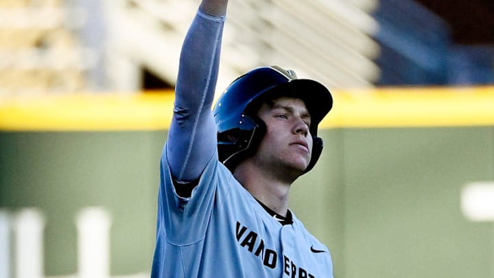 Vanderbilt’s Colin Barczi (44) reacts after hitting a bases loading double against Tennessee Tech in the first inning of an NCAA college baseball game at Hawkins Field Tuesday, Feb. 25, 2025, in Nashville, Tenn.