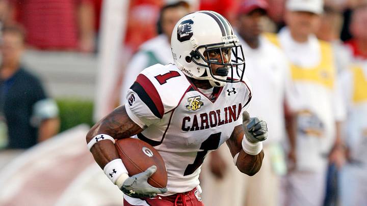 September 8, 2007; Athens, GA, USA; South Carolina Gamecocks cornerback (1) Captain Munnerlyn runs back a kick against the Georgia Bulldogs in the first half at Sanford Stadium. The Gamecocks defeated the Bulldogs 16 to 12. Mandatory Credit: Dale Zanine USA TODAY Sports Copyright (c) 2007 Dale Zanine September 8, 2007; Athens, GA, USA; South Carolina Gamecocks cornerback (1) Captain Munnerlyn runs back a kick against the Georgia Bulldogs in the first half at Sanford Stadium. The Gamecocks defeated the Bulldogs 16 to 12. Mandatory Credit: Dale Zanine USA TODAY Sports Copyright (c) 2007 Dale Zanine