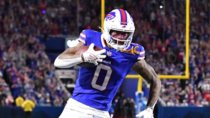 Sep 23, 2024; Orchard Park, New York, USA; Buffalo Bills wide receiver Keon Coleman (0) scores a touchdown against the Jacksonville Jaguars in the second quarter at Highmark Stadium. Mandatory Credit: Mark Konezny-Imagn Images