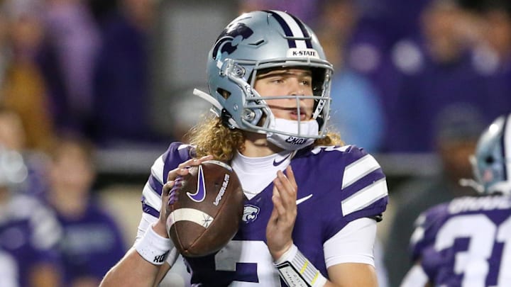 Oct 26, 2024; Manhattan, Kansas, USA; Kansas State Wildcats quarterback Avery Johnson (2) drops back to pass during the third quarter against the Kansas Jayhawks at Bill Snyder Family Football Stadium. Mandatory Credit: Scott Sewell-Imagn Images Oct 26, 2024; Manhattan, Kansas, USA; Kansas State Wildcats quarterback Avery Johnson (2) drops back to pass during the third quarter against the Kansas Jayhawks at Bill Snyder Family Football Stadium. Mandatory Credit: Scott Sewell-Imagn Images