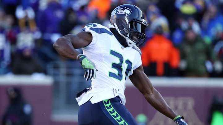 Jan 10, 2016; Minneapolis, MN, USA; Seattle Seahawks strong safety Kam Chancellor (31) celebrates after forcing a fumble by Minnesota Vikings running back Adrian Peterson (not pictured) in the fourth quarter of a NFC Wild Card playoff football game at TCF Bank Stadium.