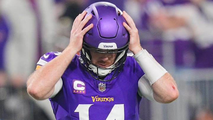 Nov 3, 2024; Minneapolis, Minnesota, USA; Minnesota Vikings quarterback Sam Darnold (14) reacts to his interception against the Indianapolis Colts in the fourth quarter at U.S. Bank Stadium. Nov 3, 2024; Minneapolis, Minnesota, USA; Minnesota Vikings quarterback Sam Darnold (14) reacts to his interception against the Indianapolis Colts in the fourth quarter at U.S. Bank Stadium.