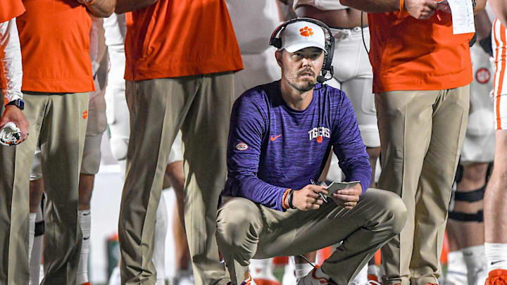 Sep 4, 2023; Durham, North Carolina, USA; Clemson Tigers offensive coordinator Garrett Riley during the third quarter against the Duke Blue Devils at Wallace Wade Stadium in Durham, N.C. Mandatory Credit: Ken Ruinard-Imagn Images Sep 4, 2023; Durham, North Carolina, USA; Clemson Tigers offensive coordinator Garrett Riley during the third quarter against the Duke Blue Devils at Wallace Wade Stadium in Durham, N.C. Mandatory Credit: Ken Ruinard-Imagn Images