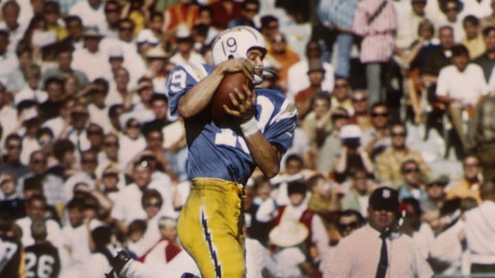 Oct 20, 1968; San Diego, CA, USA; FILE PHOTO; San Diego Chargers receiver Lance Alworth (19) cathes a pass against the Denver Broncos at San Diego Stadium. The Chargers defeated the Broncos 55-44. Mandatory Credit: Darryl Norenberg-Imagn Images