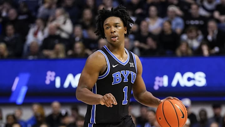 Feb 24, 2026; Provo, Utah, USA; BYU Cougars guard Robert Wright III (1) dribbles the ball during the first half against the UCF Knights at Marriott Center. Mandatory Credit: Aaron Baker-Imagn Images