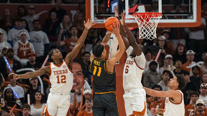 Missouri Tigers guard Trent Pierce (11) has a shot blocked at the rim in a game against the Texas Longhorns this season.