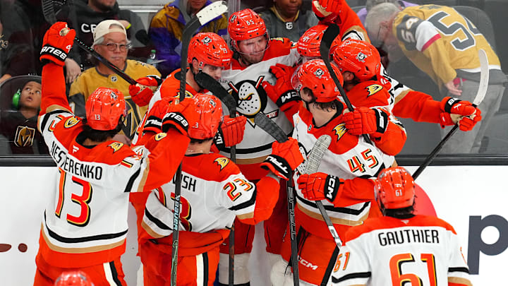 Nov 8, 2025; Las Vegas, Nevada, USA; Anaheim Ducks defenseman Jacob Trouba (65) celebrates with team mates after scoring a goal against the Vegas Golden Knights during an overtime period to give the Ducks a 4-3 victory at T-Mobile Arena. Mandatory Credit: Stephen R. Sylvanie-Imagn Images Nov 8, 2025; Las Vegas, Nevada, USA; Anaheim Ducks defenseman Jacob Trouba (65) celebrates with team mates after scoring a goal against the Vegas Golden Knights during an overtime period to give the Ducks a 4-3 victory at T-Mobile Arena. Mandatory Credit: Stephen R. Sylvanie-Imagn Images