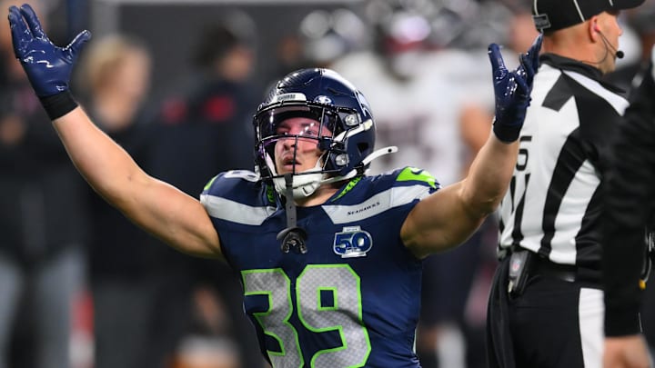 Oct 20, 2025; Seattle, Washington, USA; Seattle Seahawks safety Ty Okada (39) celebrates after sacking Houston Texans quarterback C.J. Stroud (7) during the fourth quarter at Lumen Field. Oct 20, 2025; Seattle, Washington, USA; Seattle Seahawks safety Ty Okada (39) celebrates after sacking Houston Texans quarterback C.J. Stroud (7) during the fourth quarter at Lumen Field.