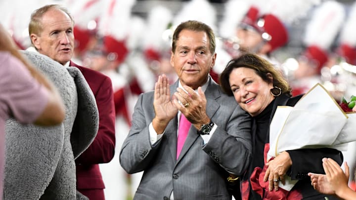 Nick Saban and family are honored at halftime with the renaming of the playing surface as Nick Saban Filed at Bryant-Denny Stadium. Terry Saban puts her head on Nick Saban’s shoulder during the ceremony.