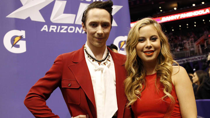 Jan 27, 2015; Phoenix, AZ, USA; NBC correspondents Tara Lipinski (right) and Johnny Weir (left) in attendance during media day for Super Bowl XLIX at US Airways Center.