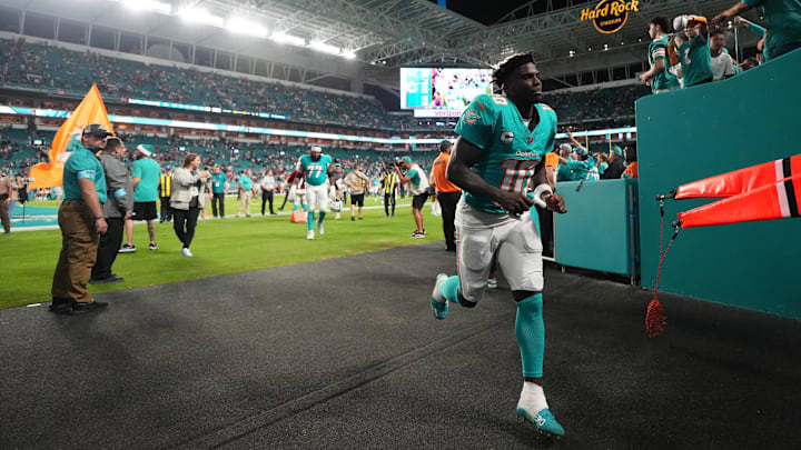 Miami Dolphins wide receiver Tyreek Hill (10) runs off the field after defeating the San Francisco 49ers at Hard Rock Stadium. Miami Dolphins wide receiver Tyreek Hill (10) runs off the field after defeating the San Francisco 49ers at Hard Rock Stadium.