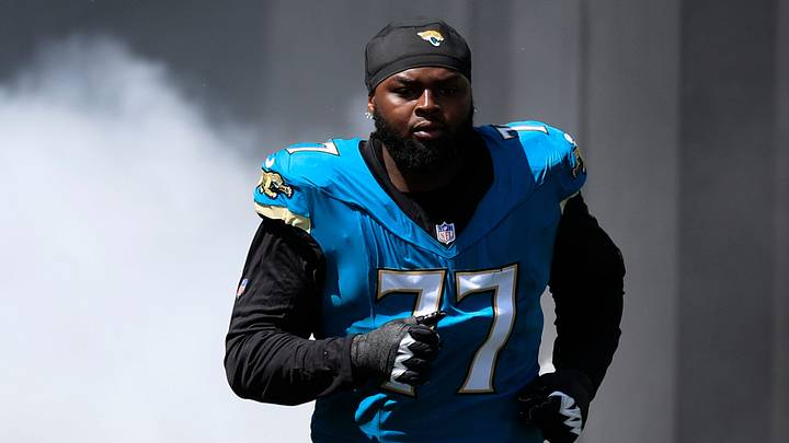 Jacksonville Jaguars offensive tackle Anton Harrison (77) is introduced before an NFL football matchup at EverBank Stadium on Sunday, Sept. 27, 2026, in Jacksonville, Fla. The Jaguars defeated the Patriots 35-6. [Corey Perrine/Florida Times‑Union]