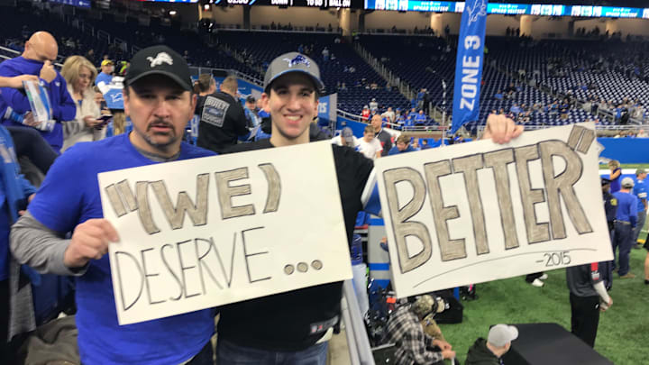 Fans hold up their signs before the Lions' game against the Buccaneers in December of 2019 at Ford Field Fans hold up their signs before the Lions' game against the Buccaneers in December of 2019 at Ford Field