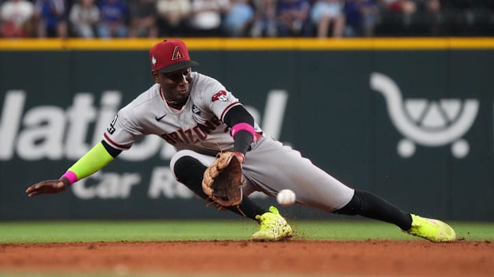 Oct 28, 2023; Arlington, TX, USA; Arizona Diamondbacks shortstop Geraldo Perdomo (2) fields a ground