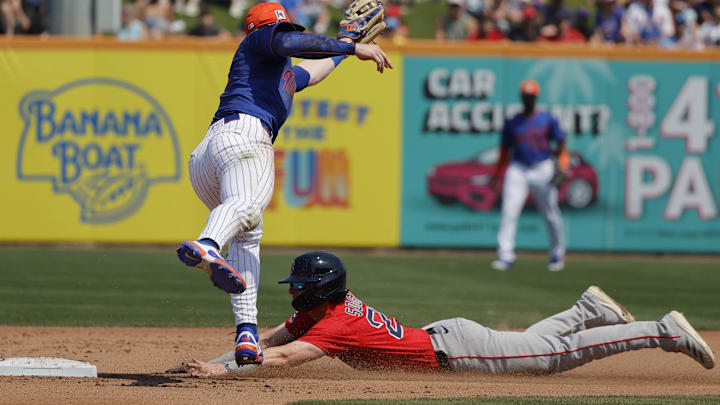 Mar 13, 2025; Port St. Lucie, Florida, USA; Boston Red Sox second base Nick Sogard (20) steals second base ahead of the tag from New York Mets second baseman Brett Baty (7) during fourth inning at Clover Park. Mandatory Credit: Reinhold Matay-Imagn Images Mar 13, 2025; Port St. Lucie, Florida, USA; Boston Red Sox second base Nick Sogard (20) steals second base ahead of the tag from New York Mets second baseman Brett Baty (7) during fourth inning at Clover Park. Mandatory Credit: Reinhold Matay-Imagn Images