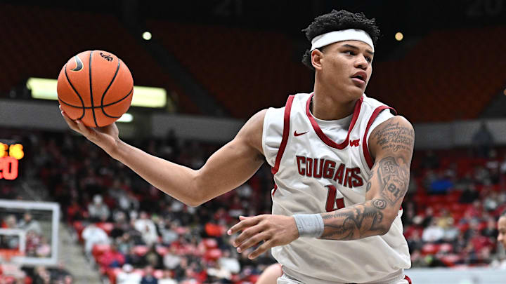 Jan 25, 2025; Pullman, Washington, USA; Washington State Cougars forward LeJuan Watts (4) rebounds the ball against the St. Mary's Gaels in the second half at Friel Court at Beasley Coliseum. Mandatory Credit: James Snook-Imagn Images