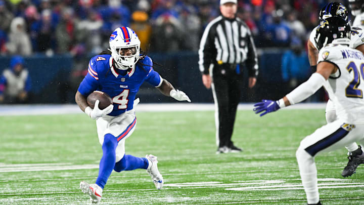 Buffalo Bills running back James Cook (4) runs the ball during the first quarter against the Baltimore Ravens Buffalo Bills running back James Cook (4) runs the ball during the first quarter against the Baltimore Ravens