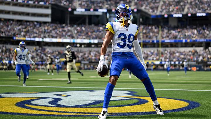 Rams safety Alex Cook (39), the former Husky, celebrates after scoring on a 100-yard interception return against New Orleans. Rams safety Alex Cook (39), the former Husky, celebrates after scoring on a 100-yard interception return against New Orleans.