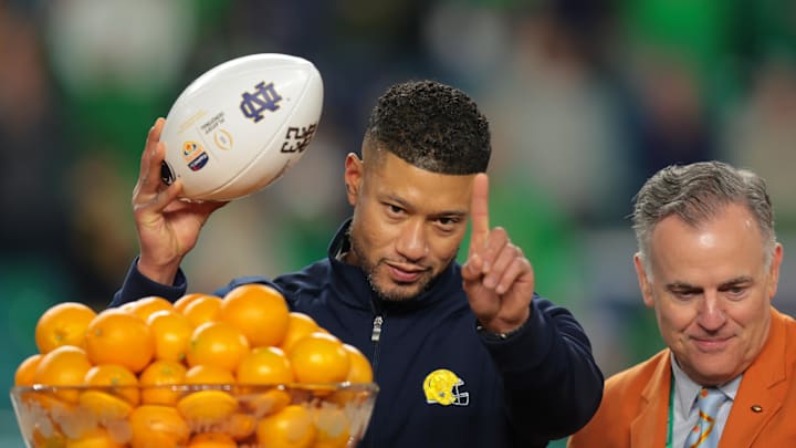(EDITORS NOTE: caption correction) Jan 9, 2025; Miami, FL, USA; Notre Dame Fighting Irish head coach Marcus Freeman celebrates defeating the Penn State Nittany Lions  in the Orange Bowl at Hard Rock Stadium. Mandatory Credit: Sam Navarro-Imagn Images
