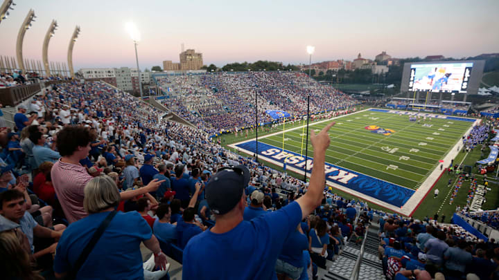 Kansas Jayhawks fans yell out during the game between Fresno State and Kansas at David Booth Kansas Memorial Stadium on Aug. 23, 2025.