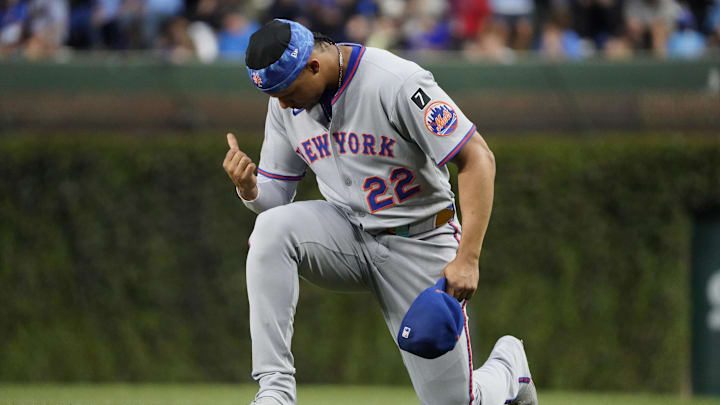 Sep 23, 2025; Chicago, Illinois, USA; New York Mets outfielder Juan Soto (22) prays before a game against the Chicago Cubs at Wrigley Field. Mandatory Credit: David Banks-Imagn Images