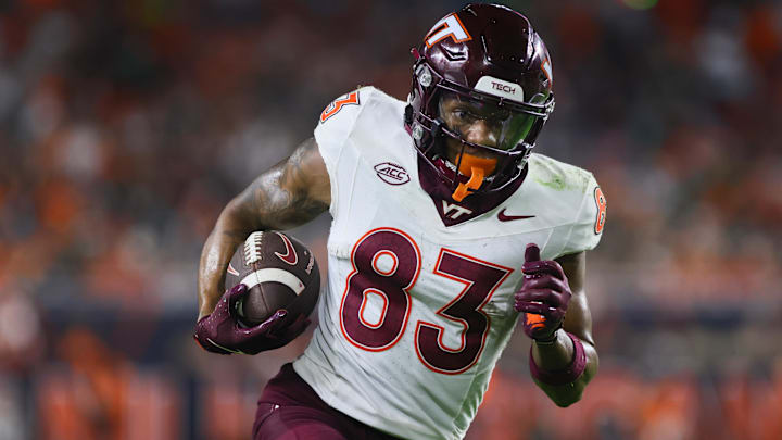 Sep 27, 2024; Miami Gardens, Florida, USA; Virginia Tech Hokies wide receiver Jaylin Lane (83) run with the football for a touchdown against the Miami Hurricanes during the second quarter at Hard Rock Stadium. Mandatory Credit: Sam Navarro-Imagn Images Sep 27, 2024; Miami Gardens, Florida, USA; Virginia Tech Hokies wide receiver Jaylin Lane (83) run with the football for a touchdown against the Miami Hurricanes during the second quarter at Hard Rock Stadium. Mandatory Credit: Sam Navarro-Imagn Images