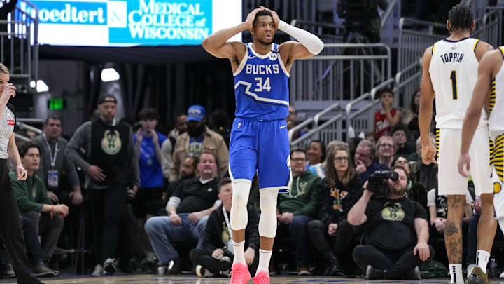 Mar 15, 2025; Milwaukee, Wisconsin, USA;  Milwaukee Bucks forward Giannis Antetokounmpo (34) reacts after fouling out  during the fourth quarter against the Indiana Pacers at Fiserv Forum. Mandatory Credit: Jeff Hanisch-Imagn Images