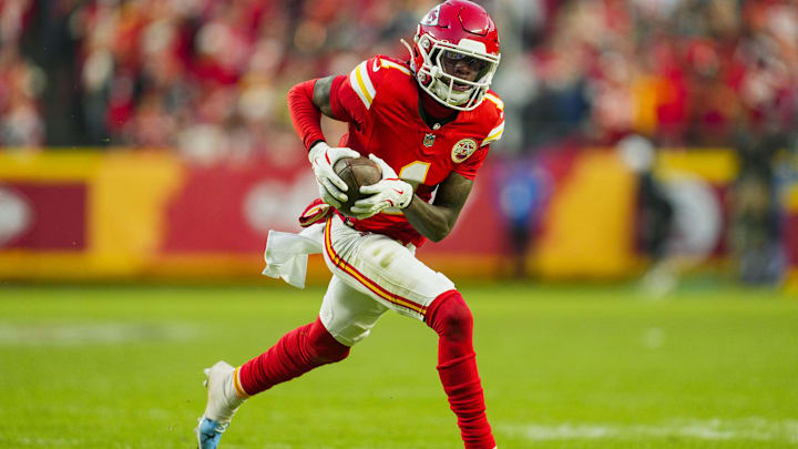 Nov 29, 2024; Kansas City, Missouri, USA; Kansas City Chiefs wide receiver Xavier Worthy (1) runs with the ball during the second half against the Las Vegas Raiders at GEHA Field at Arrowhead Stadium. Mandatory Credit: Jay Biggerstaff-Imagn Images