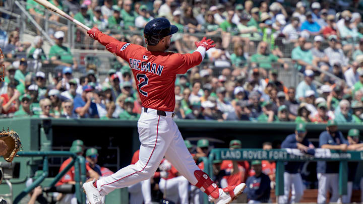 Mar 17, 2025; Fort Myers, Florida, USA; Boston Red Sox Alex Bregman (2) connects with the ball in the first inning against the Baltimore Orioles at JetBlue Park at Fenway South. Mar 17, 2025; Fort Myers, Florida, USA; Boston Red Sox Alex Bregman (2) connects with the ball in the first inning against the Baltimore Orioles at JetBlue Park at Fenway South.