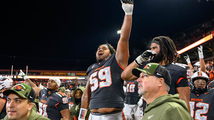 Nov 1, 2025; Corvallis, Oregon, USA; Oregon State Beavers defensive lineman Tevita Pome'E (59) celebrates on the bench at the end of the 4th quarter against the Washington State Cougars at Reser Stadium. Mandatory Credit: Craig Strobeck-Imagn Images