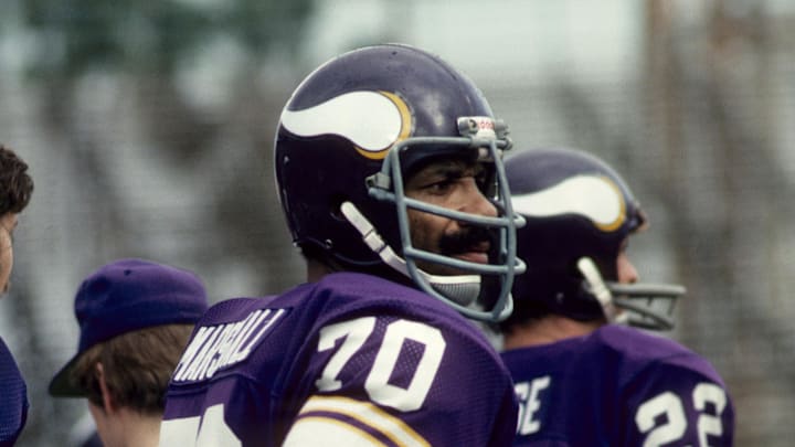 Dec 11, 1976; Minneapolis, MN, USA; FILE PHOTO; Minnesota Vikings defensive end Jim Marshall (70) on the sideline against the Miami Dolphins at the Orange Bowl. Mandatory Credit: Malcolm Emmons-Imagn Images Dec 11, 1976; Minneapolis, MN, USA; FILE PHOTO; Minnesota Vikings defensive end Jim Marshall (70) on the sideline against the Miami Dolphins at the Orange Bowl. Mandatory Credit: Malcolm Emmons-Imagn Images