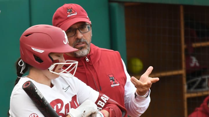 Alabama head coach Patrick Murphy talks to batter Kali Heivilin Alabama head coach Patrick Murphy talks to batter Kali Heivilin