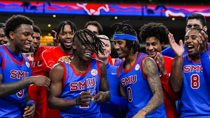 Southern Methodist Mustangs guard Boopie Miller is awarded the most valuable player trophy after winning their game in the Acrisure Series in Palm Desert, Calif., Wednesday, Nov. 27, 2024. Southern Methodist Mustangs guard Boopie Miller is awarded the most valuable player trophy after winning their game in the Acrisure Series in Palm Desert, Calif., Wednesday, Nov. 27, 2024.