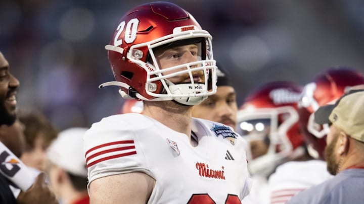 Dec 28, 2024; Tucson, AZ, USA; Miami (OH) RedHawks linebacker Adam Trick (20) against the Colorado State Rams during the Snoop Dogg Arizona Bowl at Arizona Stadium. Mandatory Credit: Mark J. Rebilas-Imagn Images