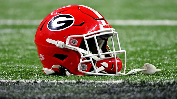 Jan 10, 2022; Indianapolis, IN, USA; A Georgia Bulldogs helmet sits on the field after the Georgia Bulldogs beat the Alabama Crimson Tide in the 2022 CFP college football national championship game at Lucas Oil Stadium. Mandatory Credit: Trevor Ruszkowski-Imagn Images