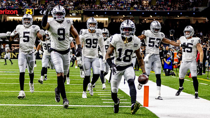 Dec 29, 2024; New Orleans, Louisiana, USA; Las Vegas Raiders cornerback Jack Jones (18) reacts to intercepting a play from New Orleans Saints quarterback Spencer Rattler (18) during the second half at Caesars Superdome. Mandatory Credit: Stephen Lew-Imagn Images Dec 29, 2024; New Orleans, Louisiana, USA; Las Vegas Raiders cornerback Jack Jones (18) reacts to intercepting a play from New Orleans Saints quarterback Spencer Rattler (18) during the second half at Caesars Superdome. Mandatory Credit: Stephen Lew-Imagn Images