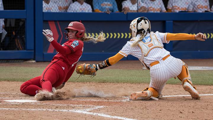 May 30, 2026; Oklahoma City, OK, USA; Texas Tech Red Raiders third baseman Taylor Pannell (6) slides safe past the tag by Tennessee Lady Volunteers catcher Elsa Morrison (22) in the seventh inning during the NCAA Women’s College World Series at Devon Park. Mandatory Credit: Brett Rojo-Imagn Images May 30, 2026; Oklahoma City, OK, USA; Texas Tech Red Raiders third baseman Taylor Pannell (6) slides safe past the tag by Tennessee Lady Volunteers catcher Elsa Morrison (22) in the seventh inning during the NCAA Women’s College World Series at Devon Park. Mandatory Credit: Brett Rojo-Imagn Images