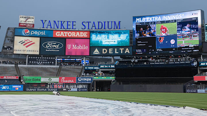 May 24, 2023; Bronx, New York, USA; The scoreboard at Yankee Stadium during a rain delay before a game between the New York Yankees and the Baltimore Orioles at Yankee Stadium. Mandatory Credit: Vincent Carchietta-USA TODAY Sports