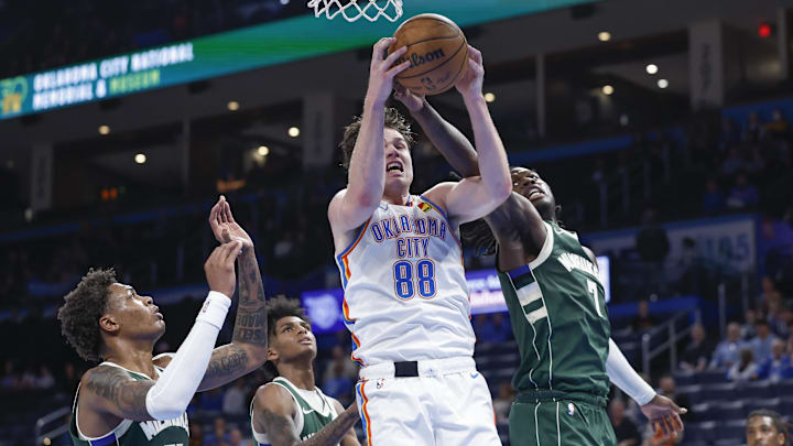 Feb 3, 2025; Oklahoma City, Oklahoma, USA; Oklahoma City Thunder guard Alex Ducas (88) fights for a rebound with Milwaukee Bucks forward Chris Livingston (7) during the second half at Paycom Center. Mandatory Credit: Alonzo Adams-Imagn Images Feb 3, 2025; Oklahoma City, Oklahoma, USA; Oklahoma City Thunder guard Alex Ducas (88) fights for a rebound with Milwaukee Bucks forward Chris Livingston (7) during the second half at Paycom Center. Mandatory Credit: Alonzo Adams-Imagn Images