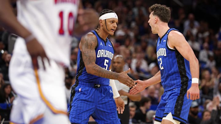 Feb 27, 2025; Orlando, Florida, USA; Orlando Magic forward Paolo Banchero (5) and forward Franz Wagner (22) celebrate after a basket against the Golden State Warriors in the second quarter at Kia Center. Mandatory Credit: Nathan Ray Seebeck-Imagn Images