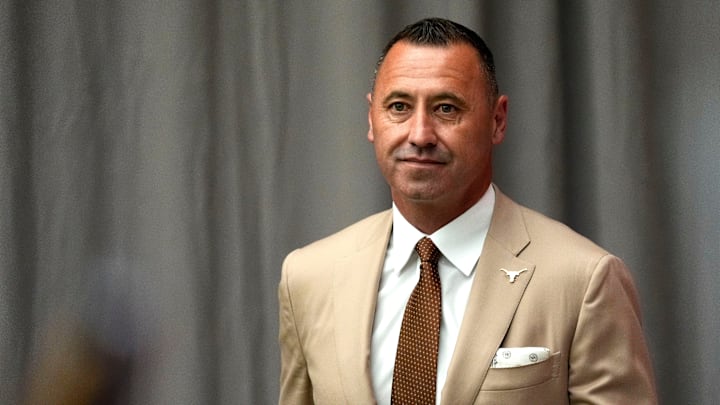 July 15, 2025; Atlanta, GA, USA; Texas head coach Steve Sarkisian waits off stage as he is introduced during SEC Media Days at the College Football Hall of Fame in Atlanta.