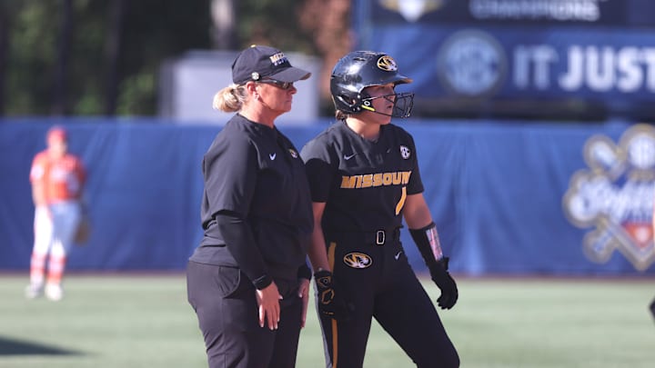 May 9, 2024; Auburn, AL, USA; Missouri Tigers head coach Larissa Anderson talks with infielder Maddie Gallagher (1) during the game against the Florida Gators in the SEC Softball Championship game at Jane B. Moore Field. Mandatory Credit: John Reed-Imagn Images May 9, 2024; Auburn, AL, USA; Missouri Tigers head coach Larissa Anderson talks with infielder Maddie Gallagher (1) during the game against the Florida Gators in the SEC Softball Championship game at Jane B. Moore Field. Mandatory Credit: John Reed-Imagn Images