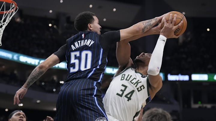 Milwaukee Bucks forward Giannis Antetokounmpo (34) drives to the basket against Orlando Magic guard Cole Anthony (50) win the first half at Fiserv Forum.