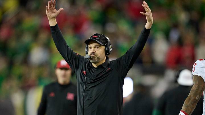 Matt Rhule signals a touchdown by wide receiver Kwazi Gilmer late in the first half against Oregon. Matt Rhule signals a touchdown by wide receiver Kwazi Gilmer late in the first half against Oregon.