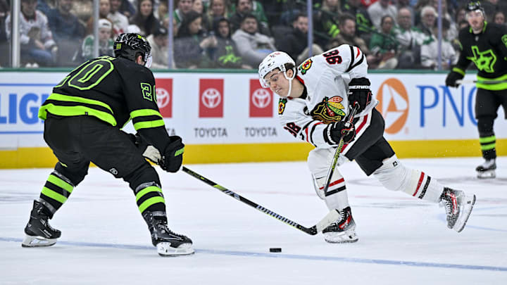 Dec 31, 2023; Dallas, Texas, USA; Chicago Blackhawks center Connor Bedard (98) and Dallas Stars