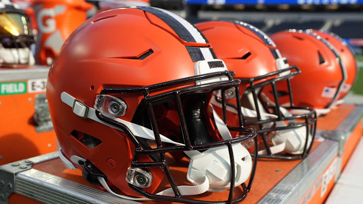 Dec 3, 2023; Inglewood, California, USA; Riddell speedflex Cleveland Browns helmets on the sidelines at SoFi Stadium.  