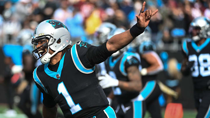 CHARLOTTE, NC - NOVEMBER 21: Carolina Panthers quarterback Cam Newton (1) celebrates after the Panthers scored a touchdown during the first quarter of the game between the Washington Football team and Carolina Panthers at Bank of America Stadium. CHARLOTTE, NC - NOVEMBER 21: Carolina Panthers quarterback Cam Newton (1) celebrates after the Panthers scored a touchdown during the first quarter of the game between the Washington Football team and Carolina Panthers at Bank of America Stadium.