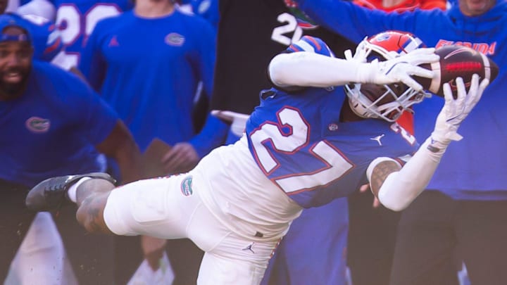 Florida Gators defensive back Dijon Johnson (27) intercepts the ball but was called back during the second half at Ben Hill Griffin Stadium in Gainesville, FL on Saturday, November 23, 2024. The Gators defeated the Rebels 24-17 [Doug Engle/Gainesville Sun]