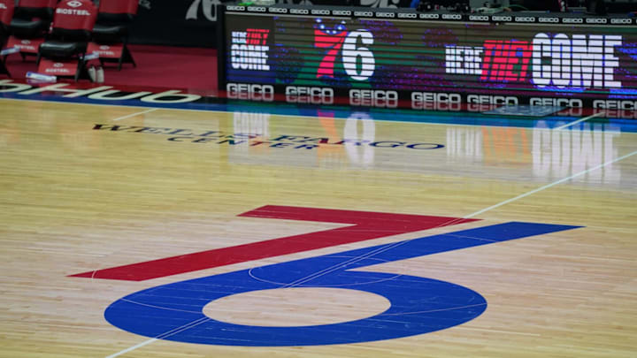 Jan 9, 2021; Philadelphia, Pennsylvania, USA; Philadelphia 76ers logo at center court before a game against the Denver Nuggets at Wells Fargo Center. Mandatory Credit: Bill Streicher-Imagn Images